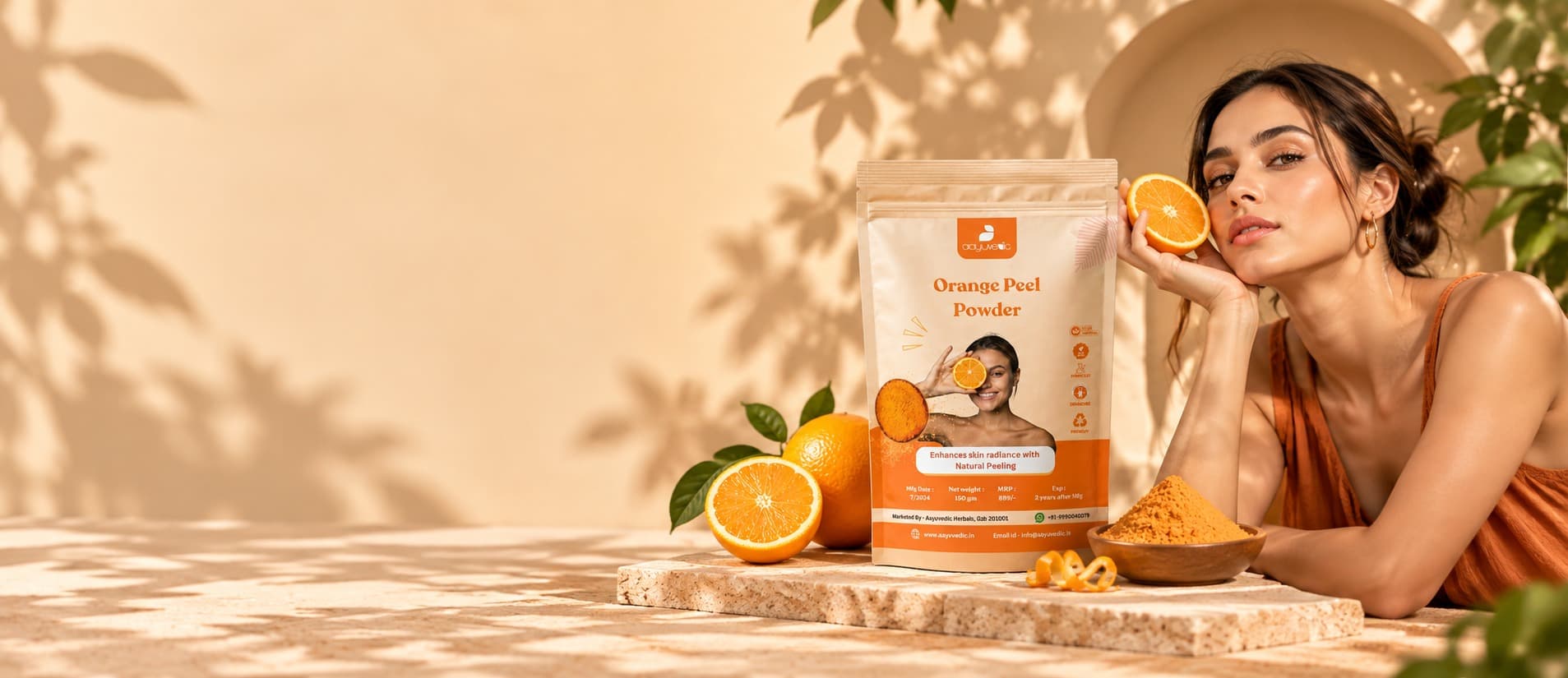 Orange Peel Powder pouch with fresh oranges and a bowl of powder, beside a woman holding an orange slice